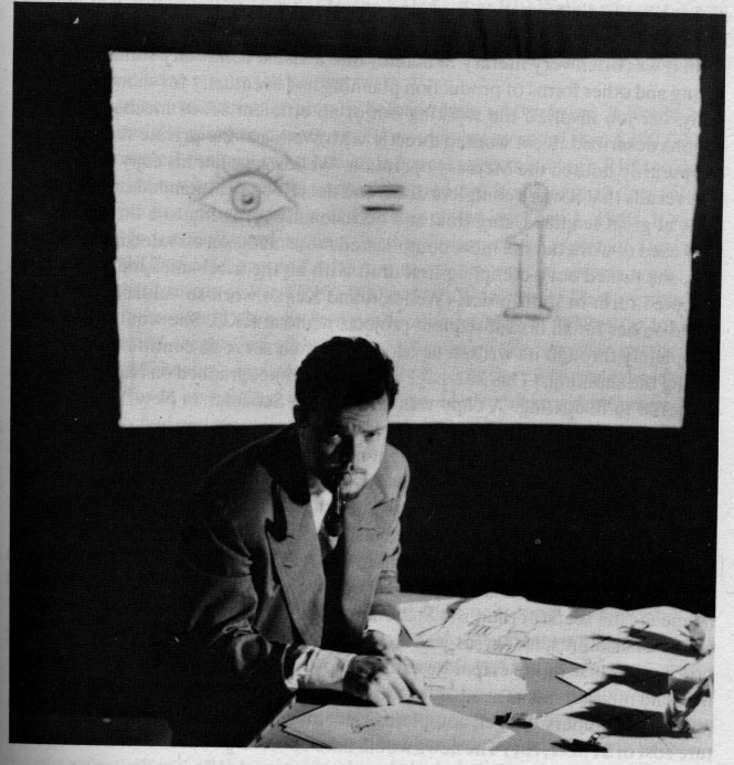 Orson Welles with the 'eye-I' equation (Heart of Darkness, 1939)